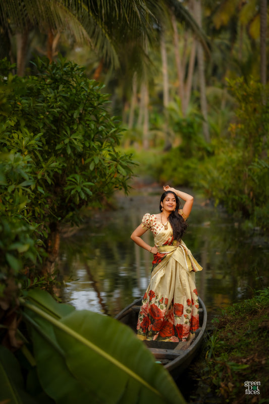 Tissue Dhavani set with red rose printed stitched skirt and matching unstitched blouse.