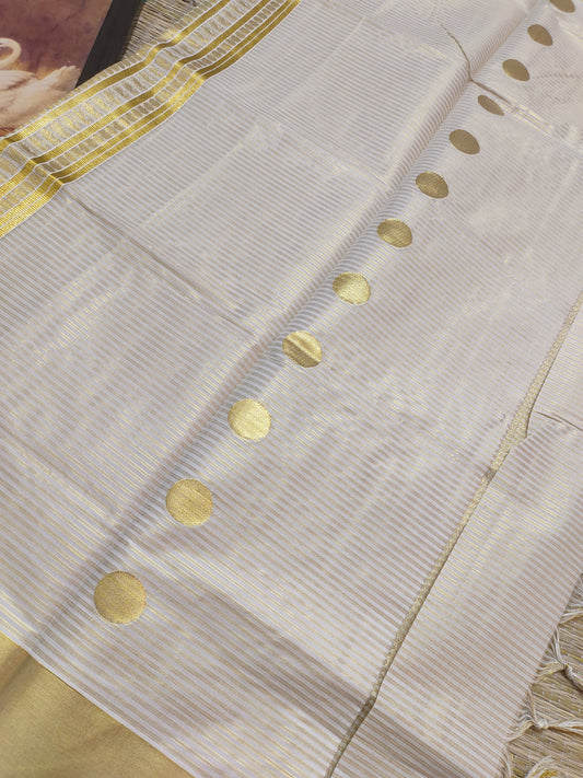 Premium Cotton Tissue Saree With All-Over Zari Lines, Polka Weave, And Brocade Blouse.