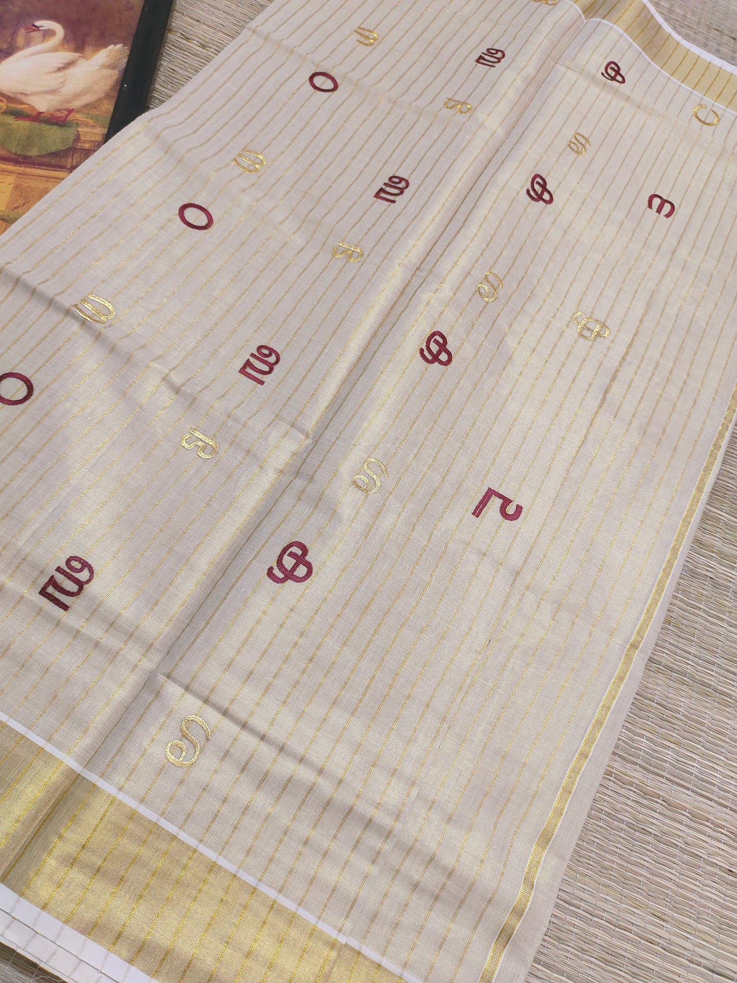 Aksharamala Embroidered Kasavu Saree- MAROON