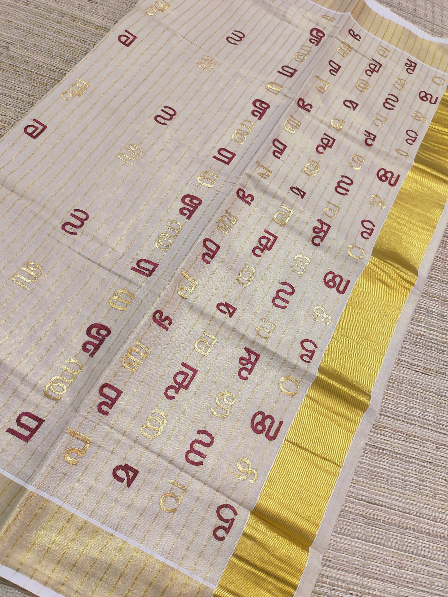 Aksharamala Embroidered Kasavu Saree- MAROON