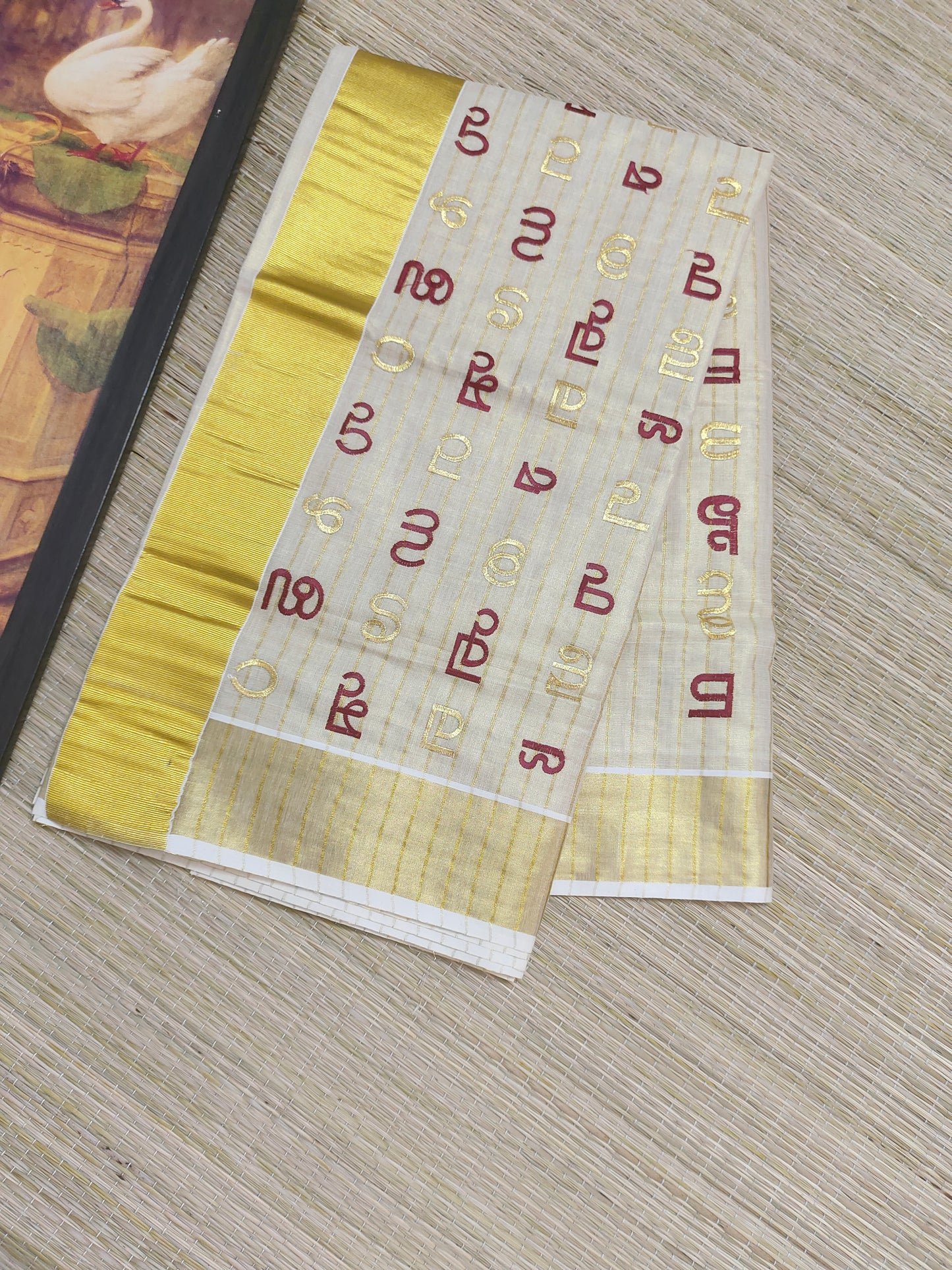 Aksharamala Embroidered Kasavu Saree- MAROON