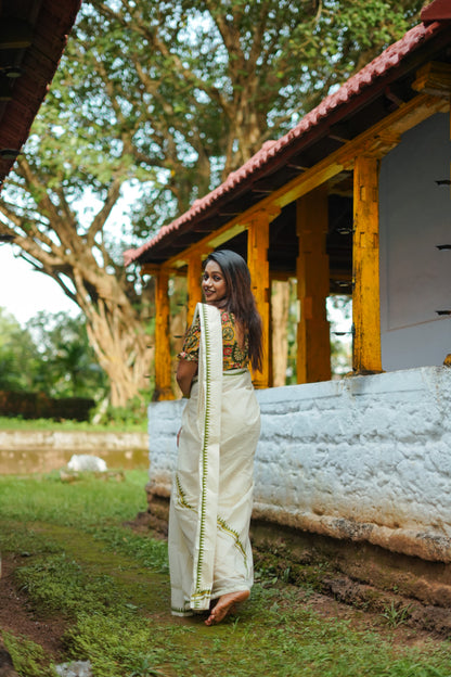 Cotton Puliyilakara Set Mundu With Temple Prints And Premium Ajrakh Blouse.