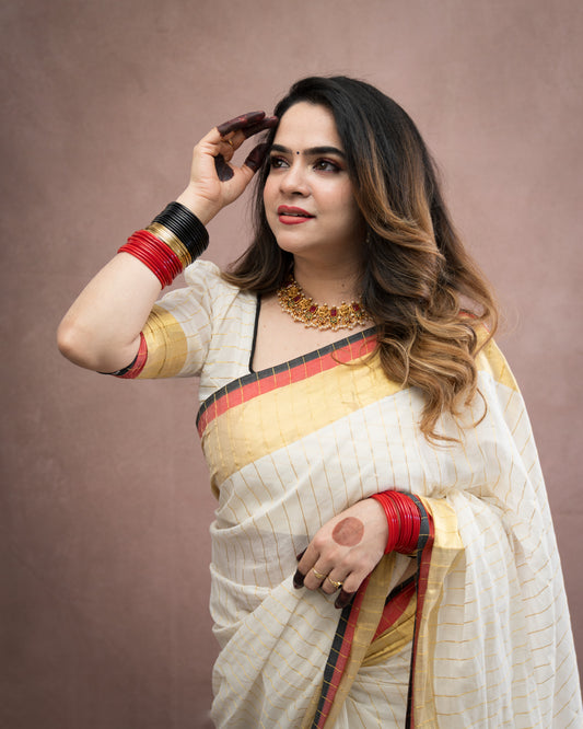Kuthampully  handloom cotton saree with all-over Stripes -