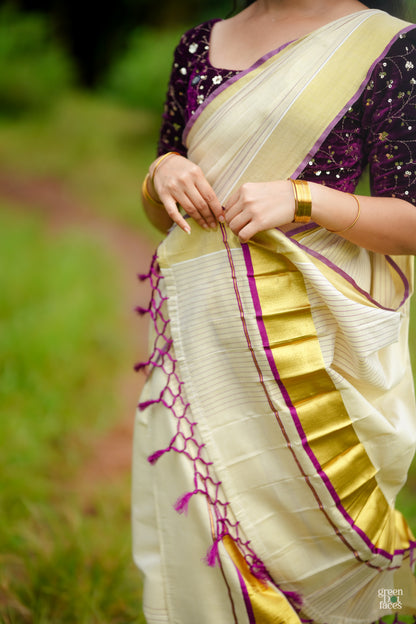 Half Plain Half Lines Tissue Set Mundu With Tassels And Velvet Sequence Blouse.