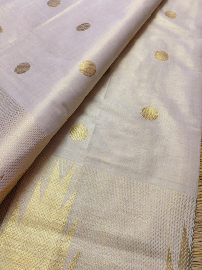 Premium Tissue Saree With Temple Border And All-Over Polka Dots.