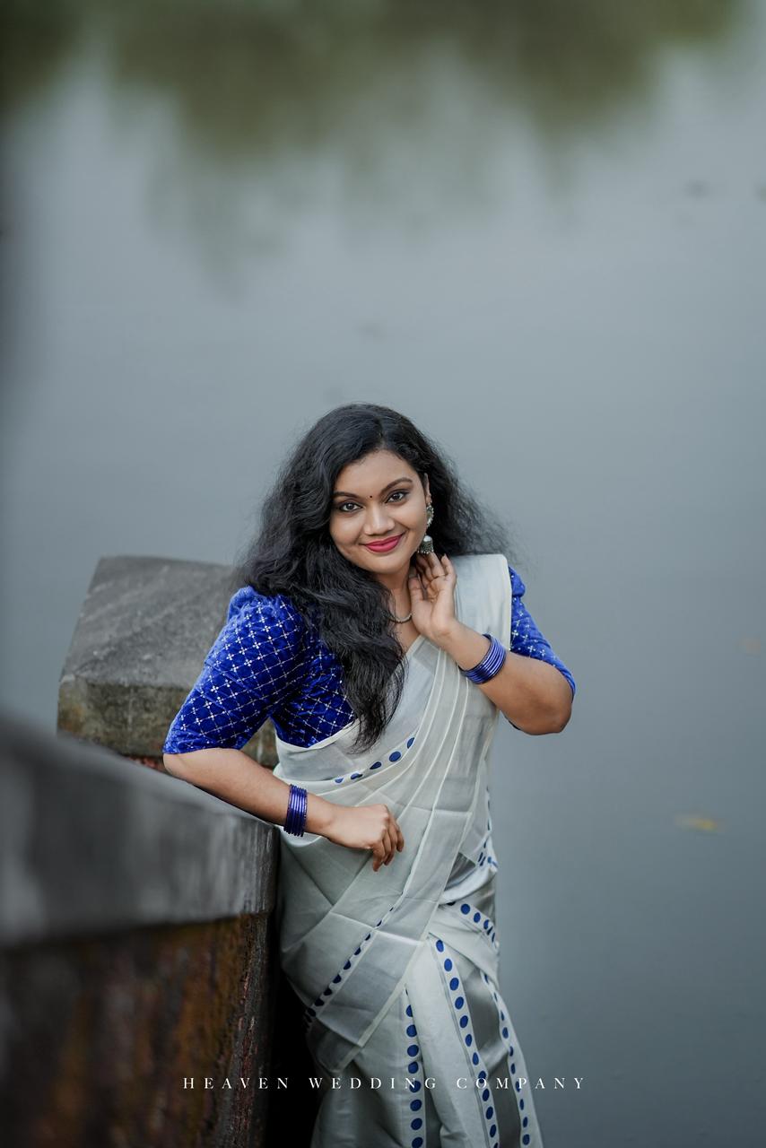 Silver tissue Kerala Set Mundu with blue polka prints and a premium sequence work velvet blouse (2.80m).
