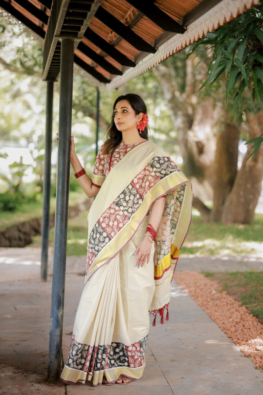 Premium gold tissue saree with maroon borders, hand block prints, and a fully printed blouse