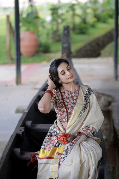 Premium gold tissue saree with maroon borders, hand block prints, and a fully printed blouse