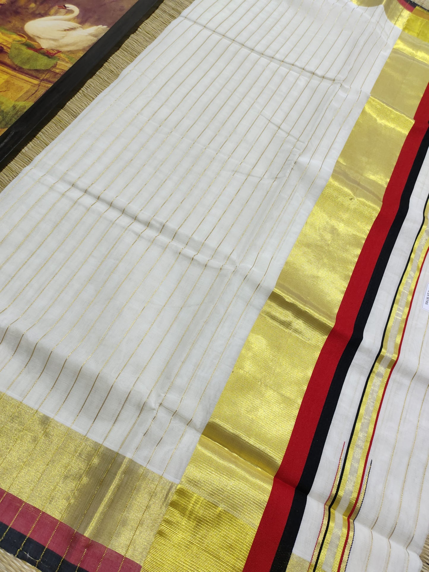 Kuthampully  handloom cotton saree with all-over Stripes -