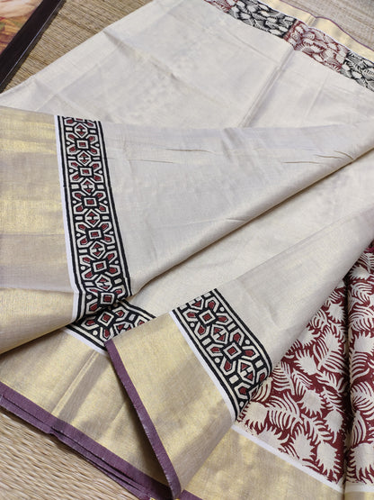 Premium gold tissue saree with maroon borders, hand block prints, and a fully printed blouse