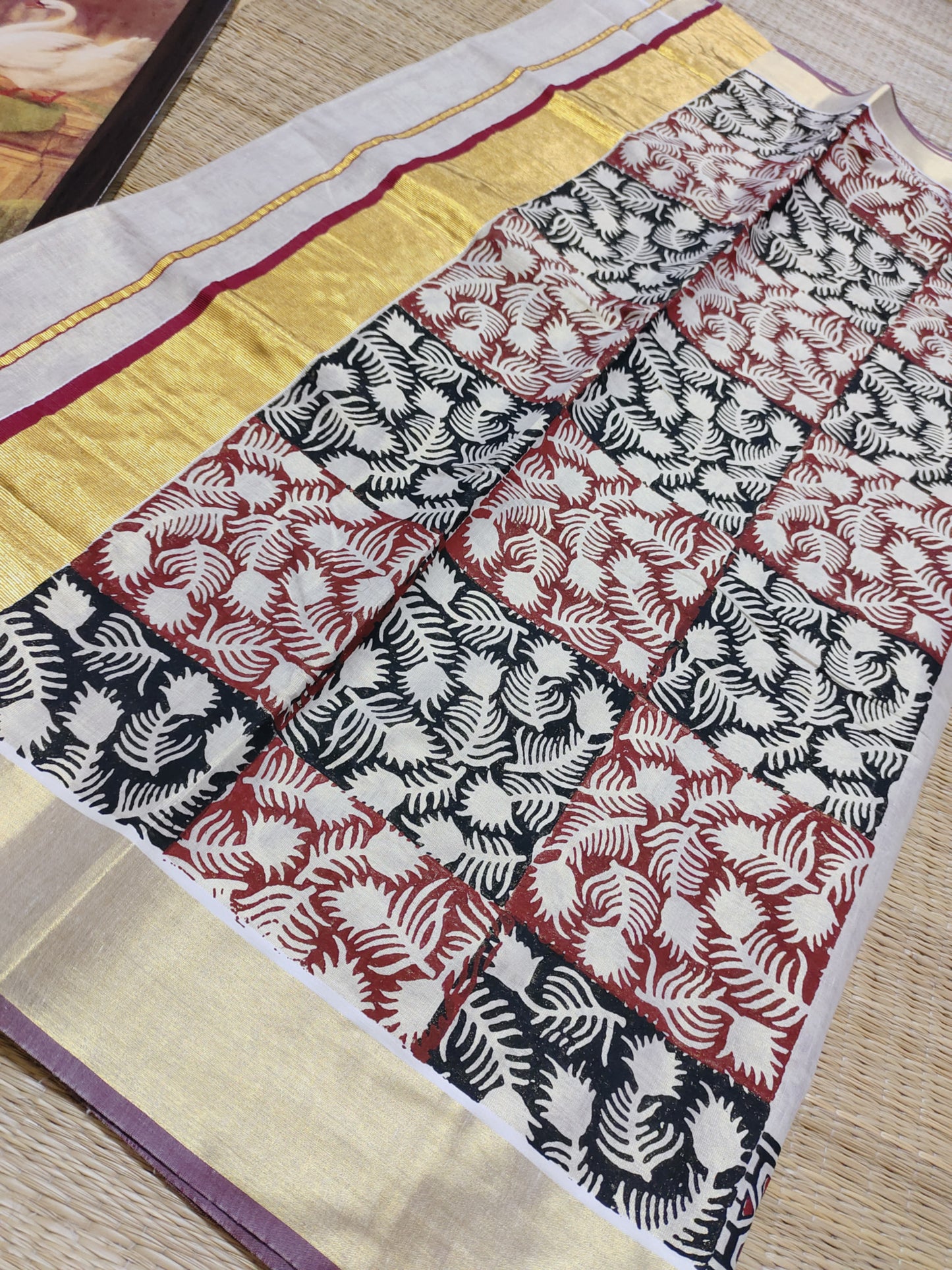 Premium gold tissue saree with maroon borders, hand block prints, and a fully printed blouse