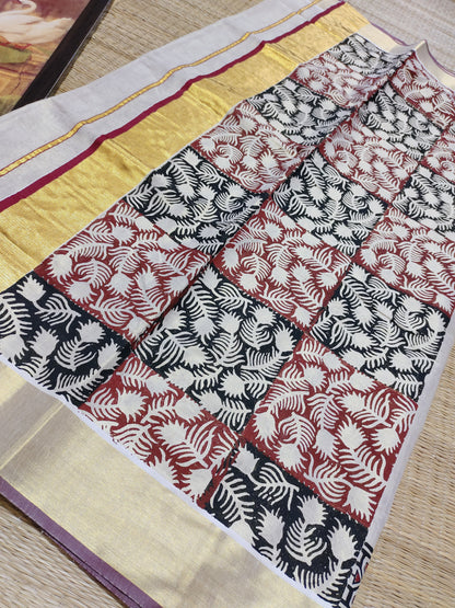Premium gold tissue saree with maroon borders, hand block prints, and a fully printed blouse