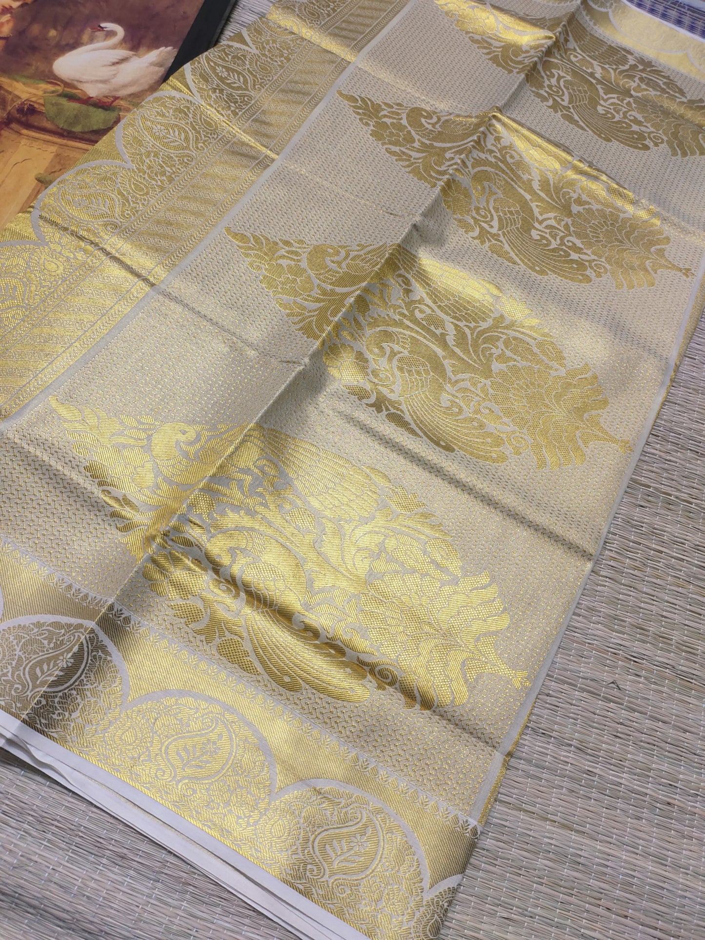 Premium tissue saree with all-over weave & grand pallu