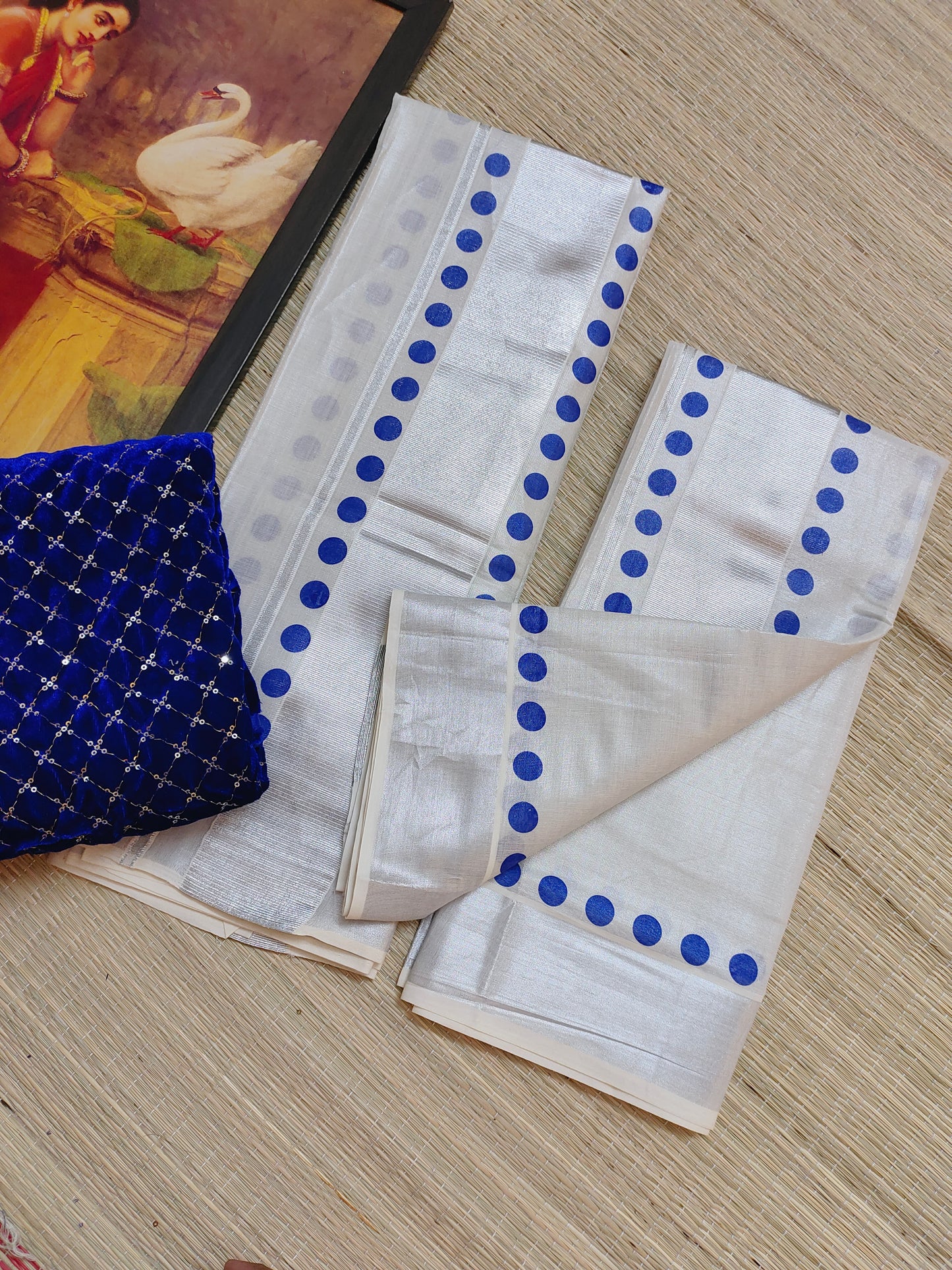 Silver tissue Kerala Set Mundu with blue polka prints and a premium sequence work velvet blouse (2.80m).
