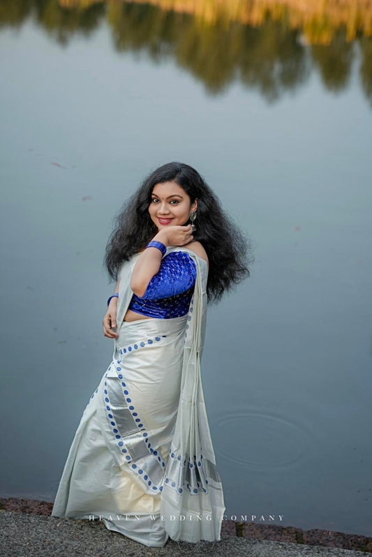 Silver tissue Kerala Set Mundu with blue polka prints and a premium sequence work velvet blouse (2.80m).