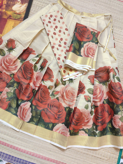 Tissue Dhavani set with red rose printed stitched skirt and matching unstitched blouse.