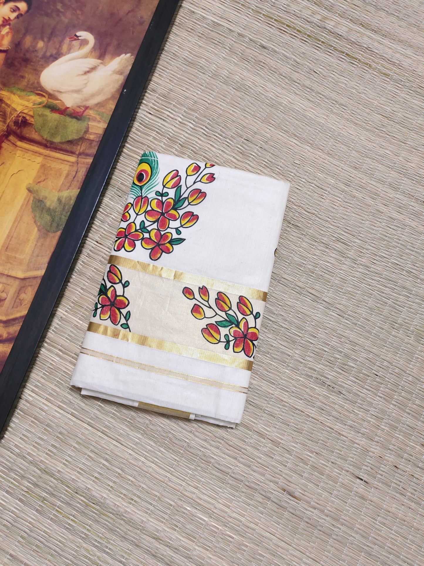 Pure cotton saree with floral prints and a plain running blouse