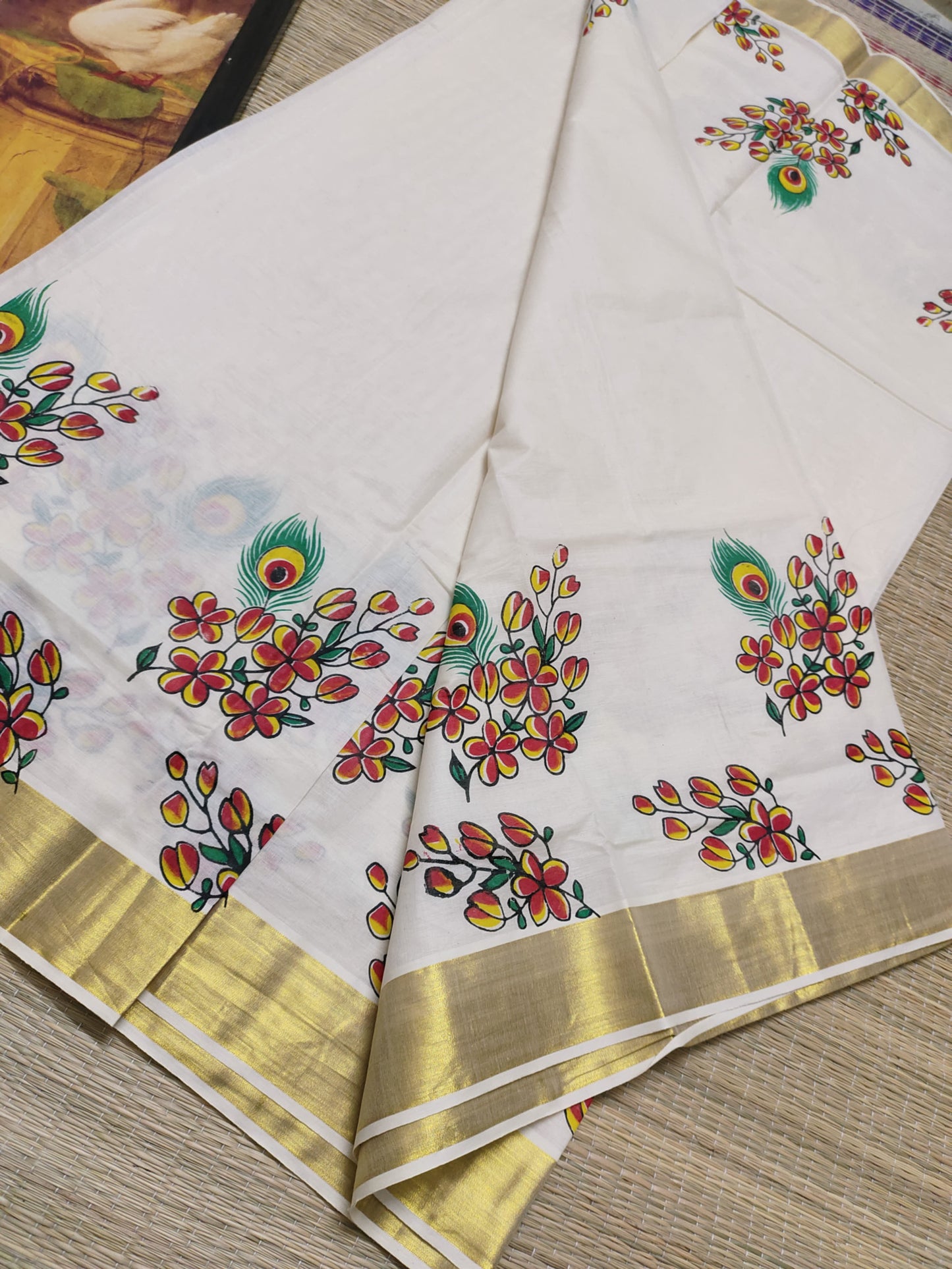 Pure cotton saree with floral prints and a plain running blouse