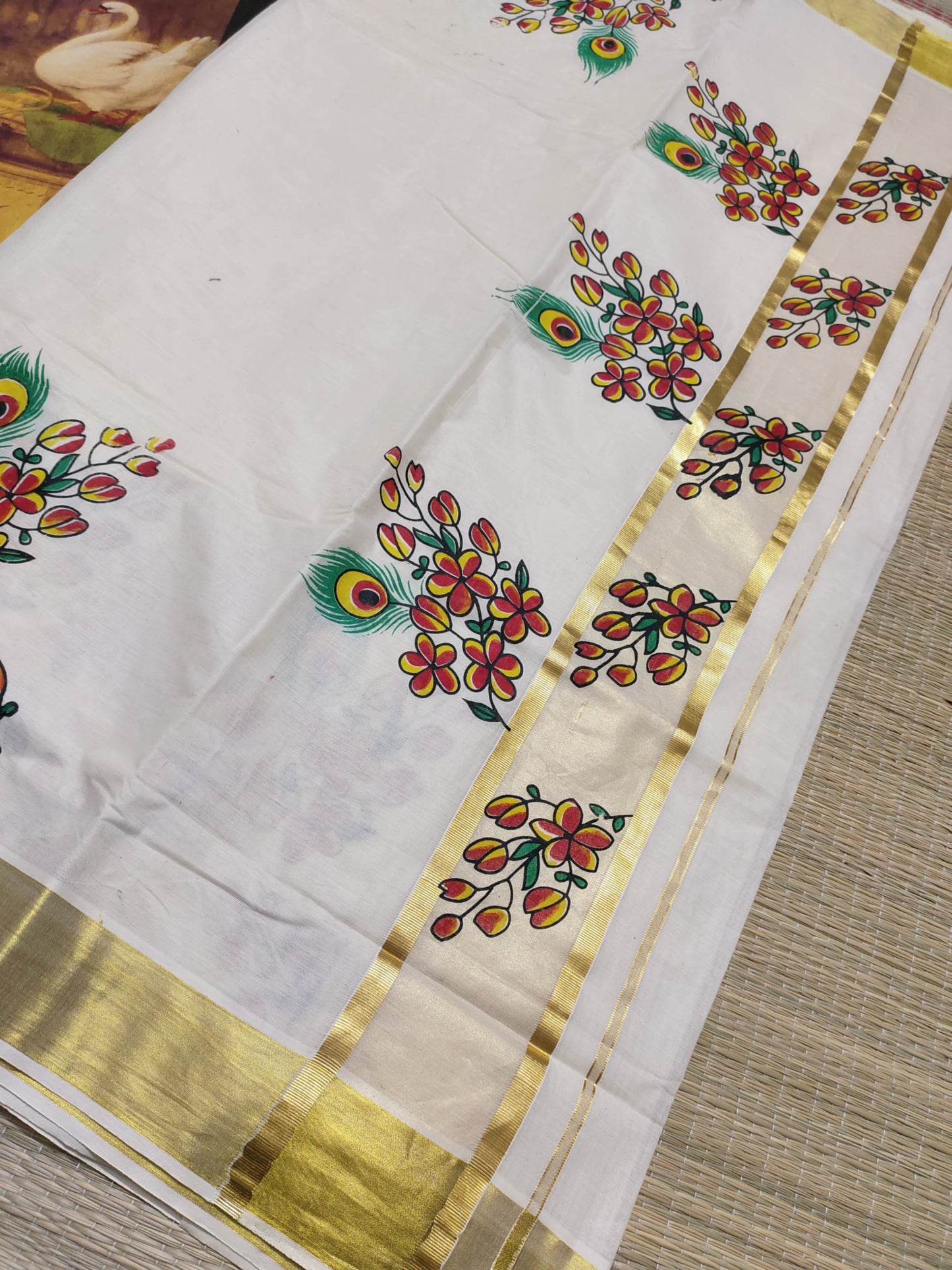 Pure cotton saree with floral prints and a plain running blouse
