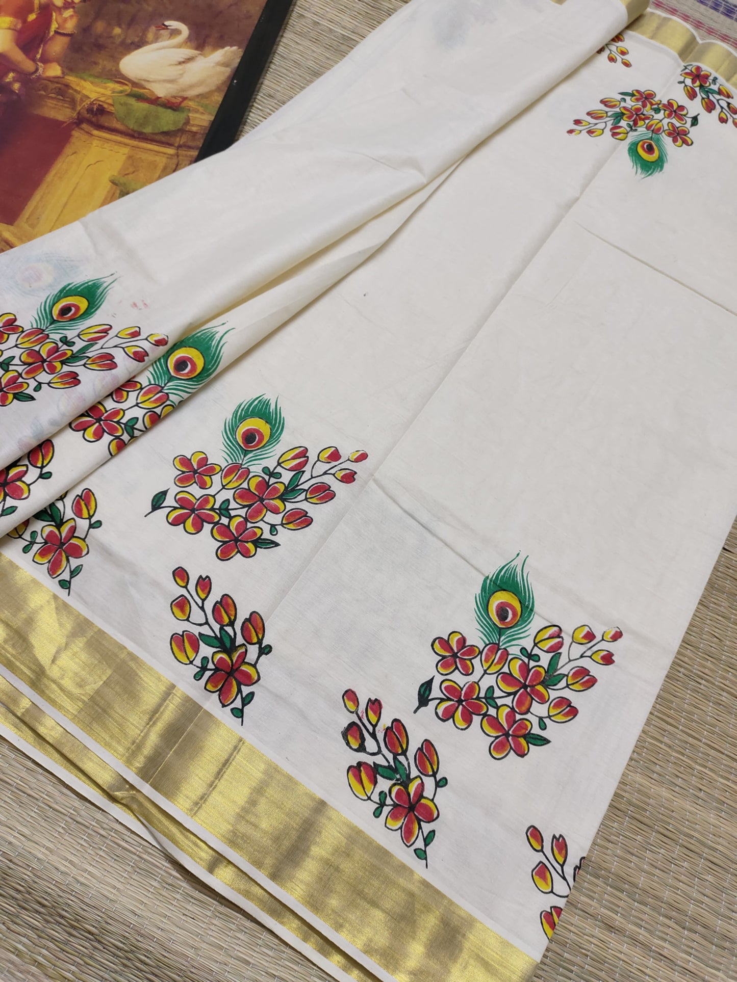 Pure cotton saree with floral prints and a plain running blouse
