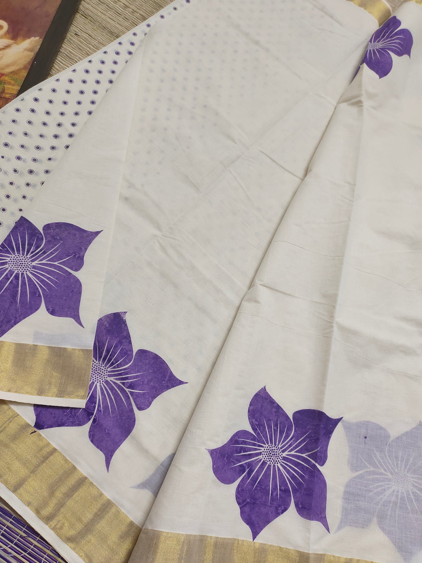 Premium cotton Kerala saree with trending floral prints and premium zari