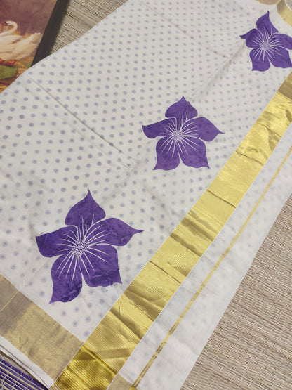 Premium cotton Kerala saree with trending floral prints and premium zari