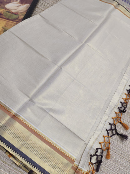 Tissue saree featuring an orange and purple kasavu