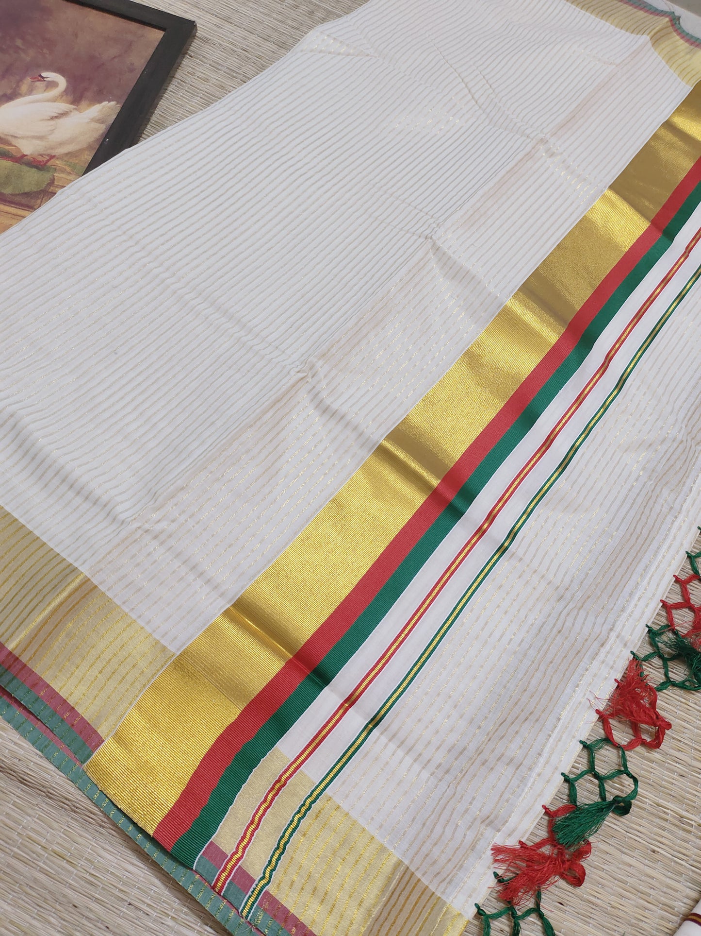 Pure cotton Kerala saree featuring all-over stripes