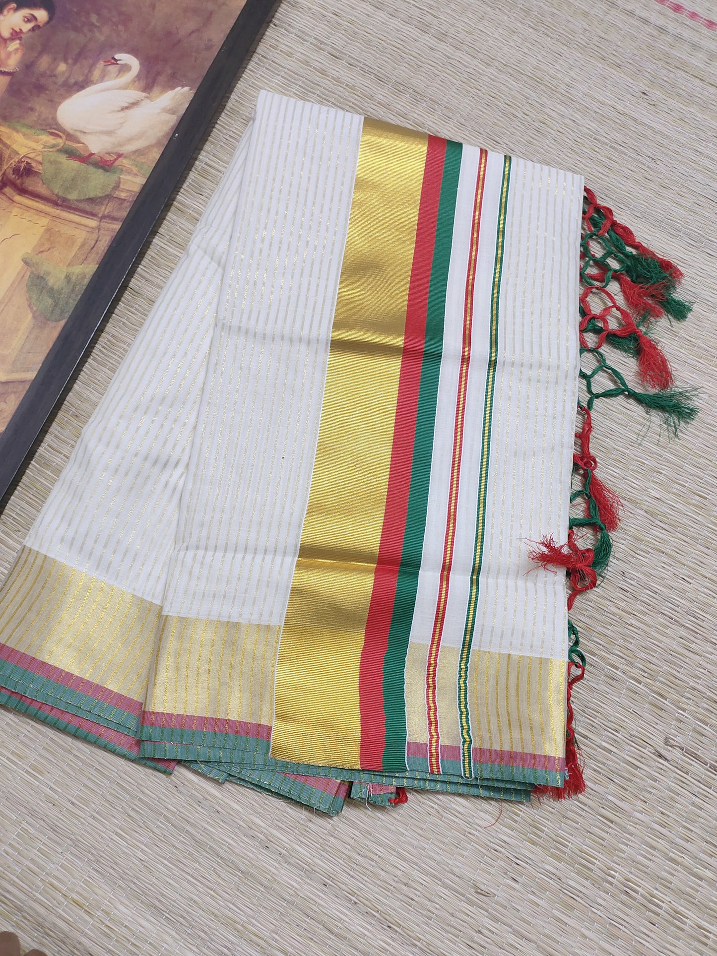 Pure cotton Kerala saree featuring all-over stripes