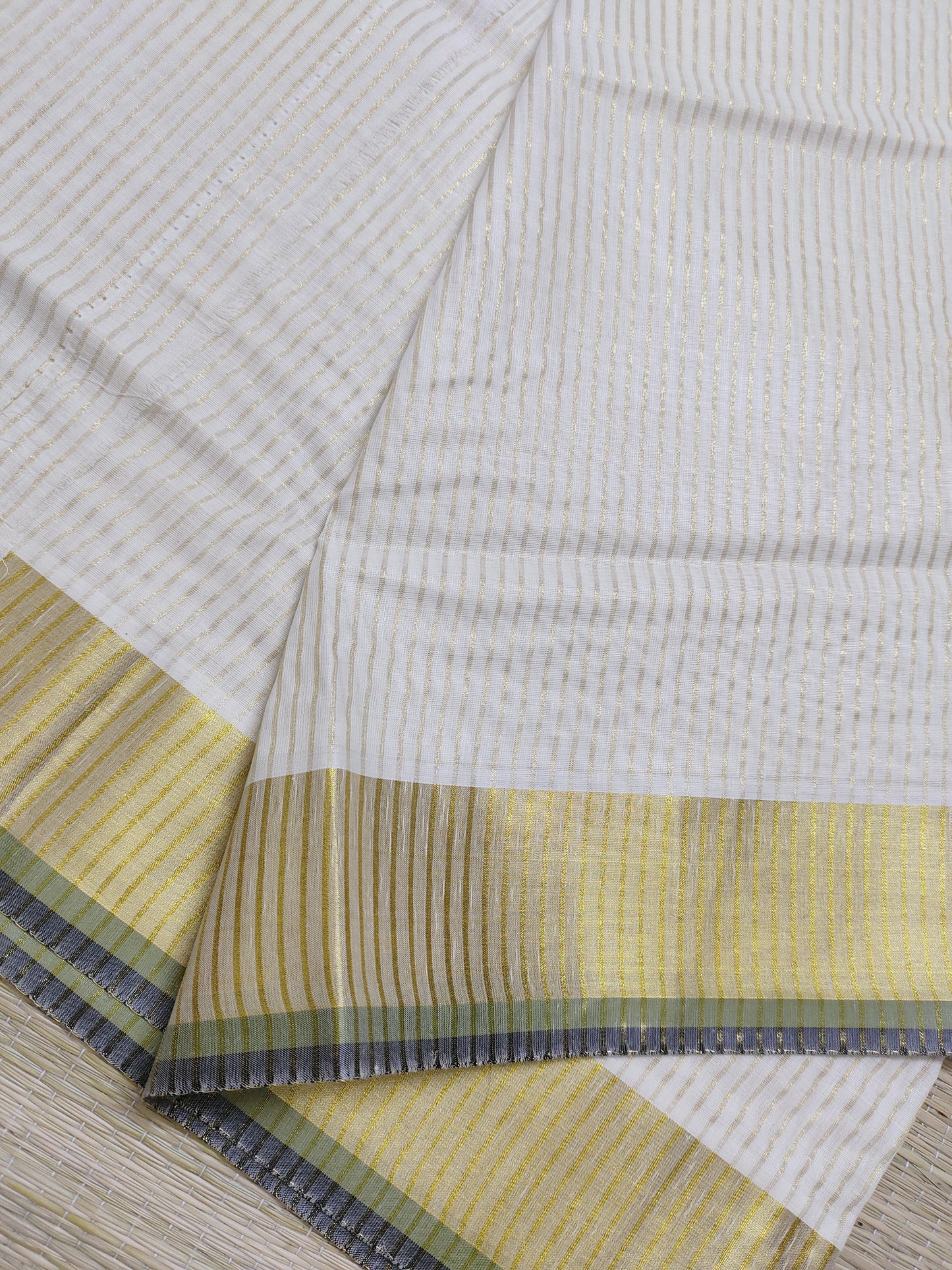 Pure cotton Kerala saree featuring all-over stripes