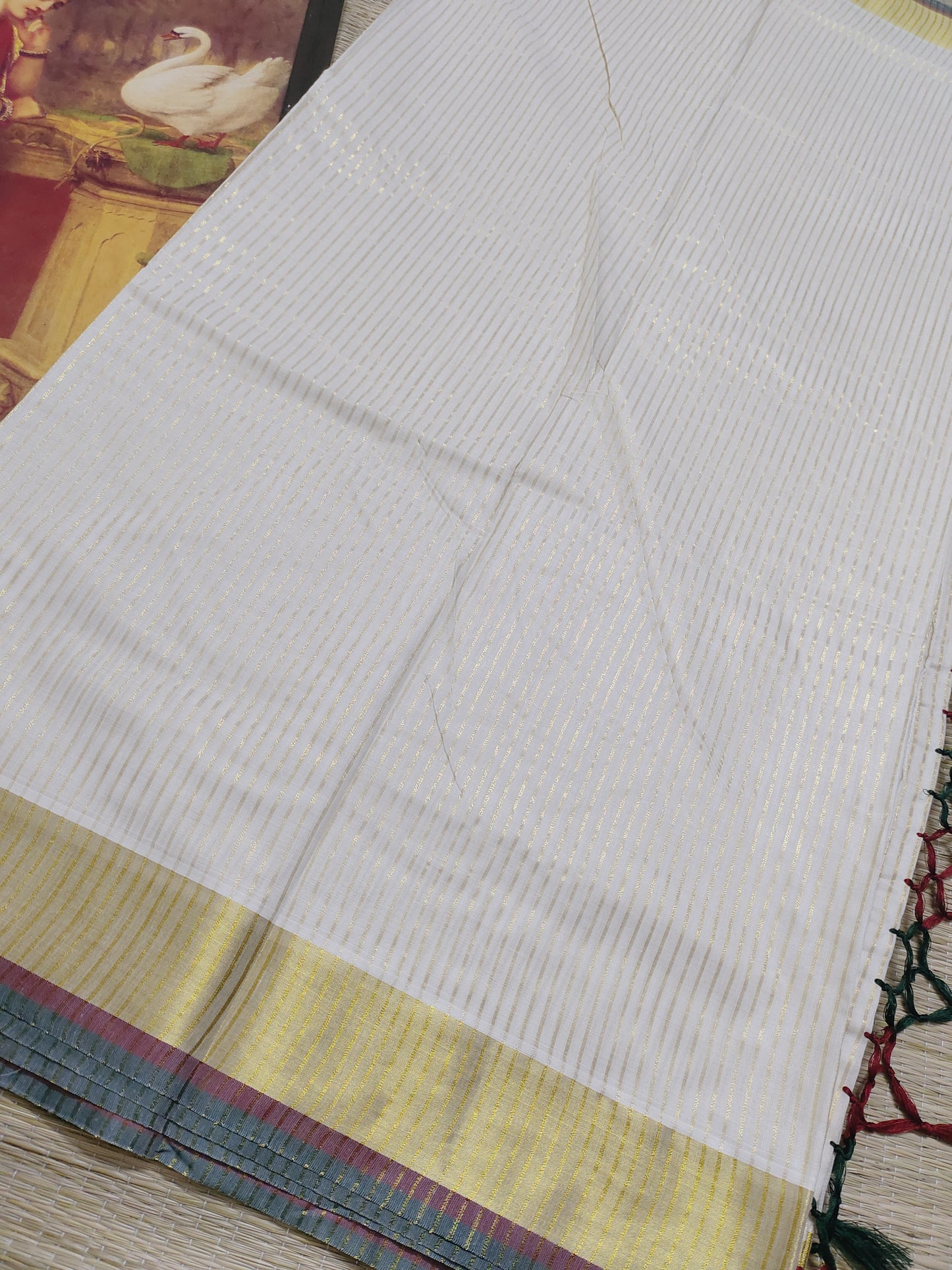 Pure cotton Kerala saree featuring all-over stripes