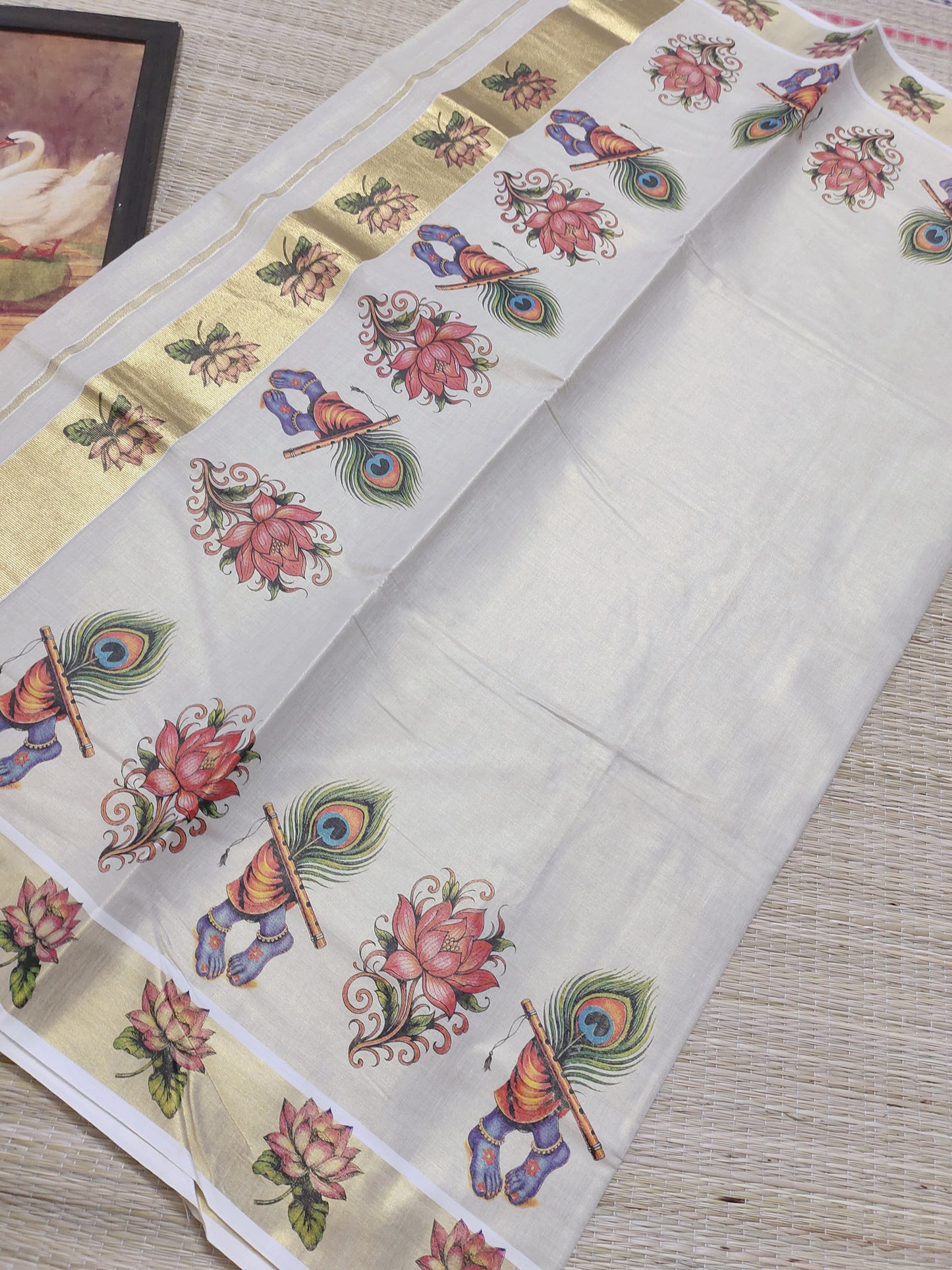 Premium tissue saree in elegant Pichwai-inspired prints