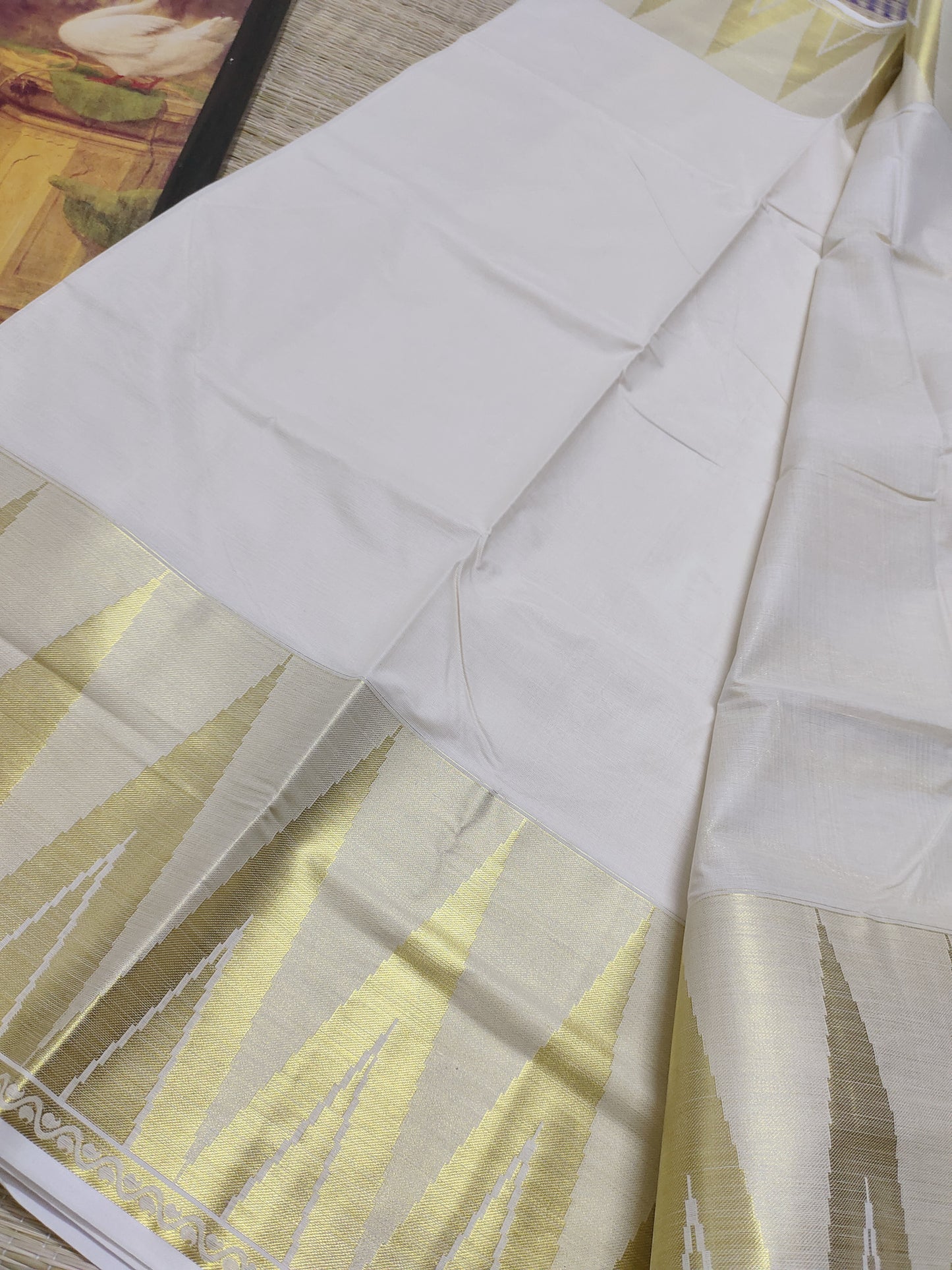 Premium cotton saree with temple borders and a rich pallu