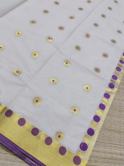 Premium Cotton Saree With All-Over Polka Weave And Woven Pallu.