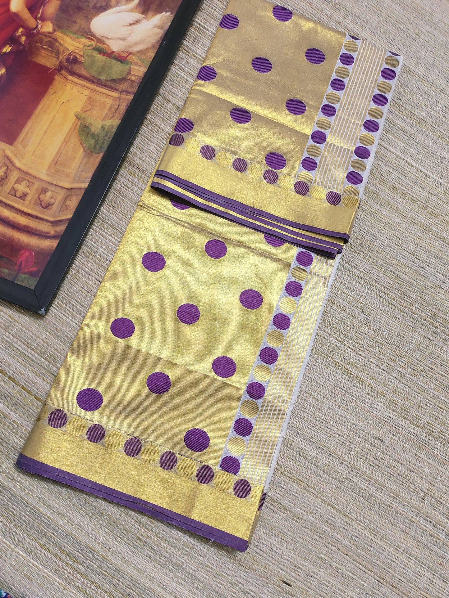 Premium Cotton Saree With All-Over Polka Weave And Woven Pallu.