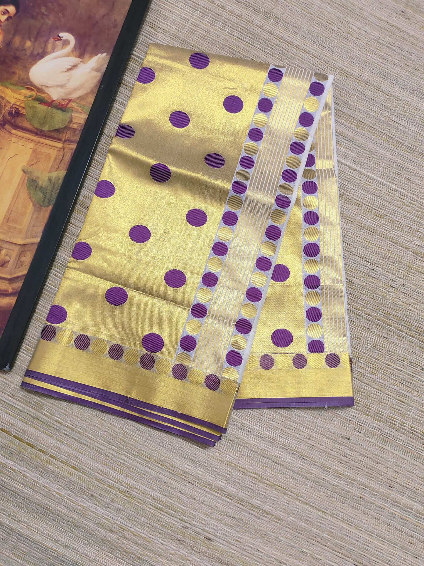 Premium Cotton Saree With All-Over Polka Weave And Woven Pallu.