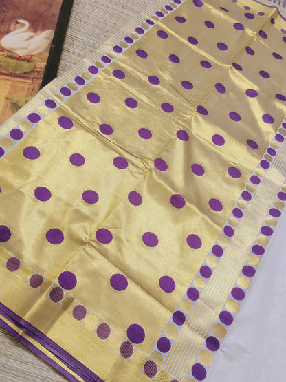 Premium Cotton Saree With All-Over Polka Weave And Woven Pallu.
