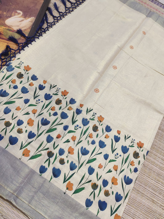 Premium  tissue saree featuring elegant floral prints