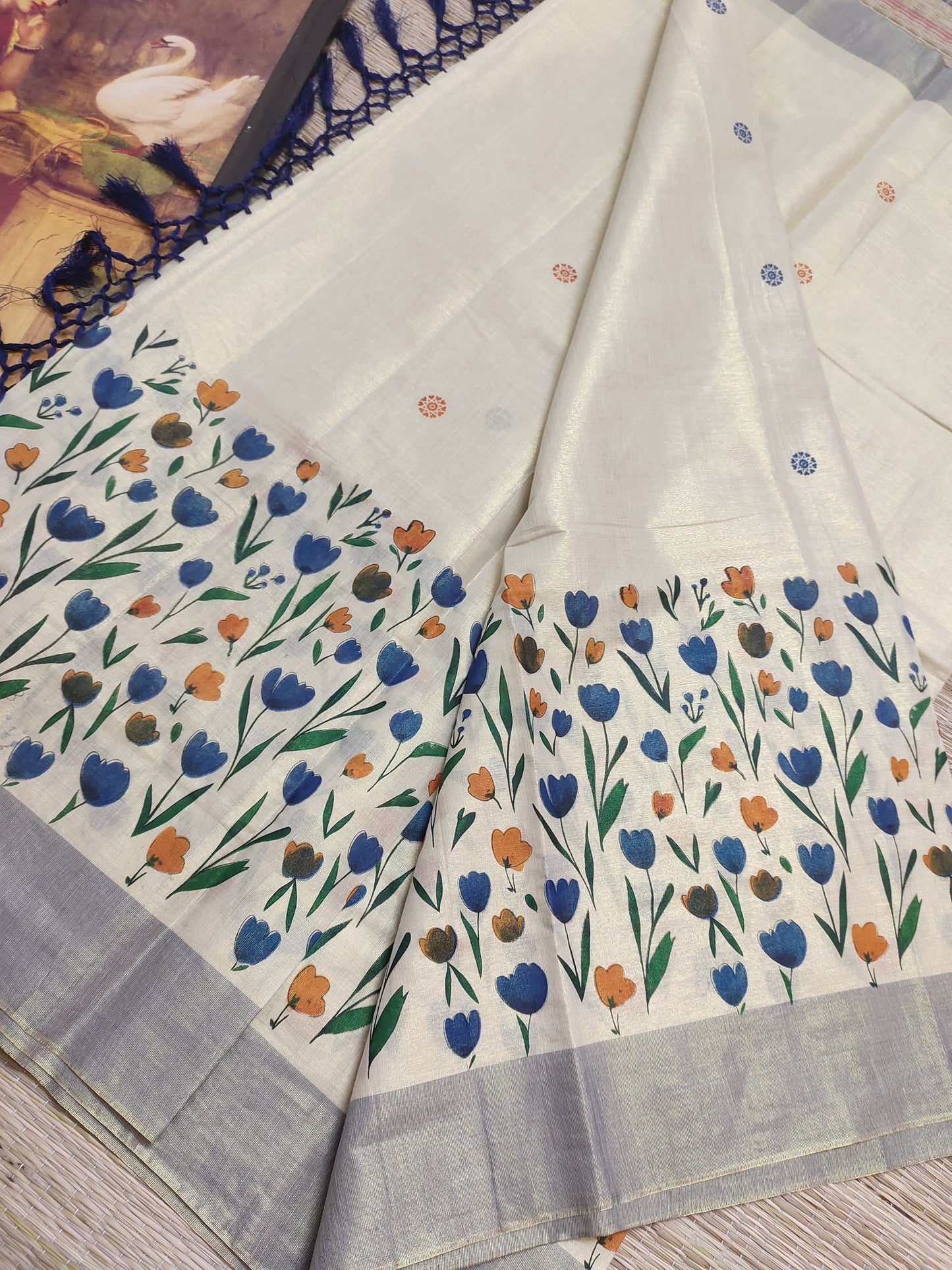Premium  tissue saree featuring elegant floral prints