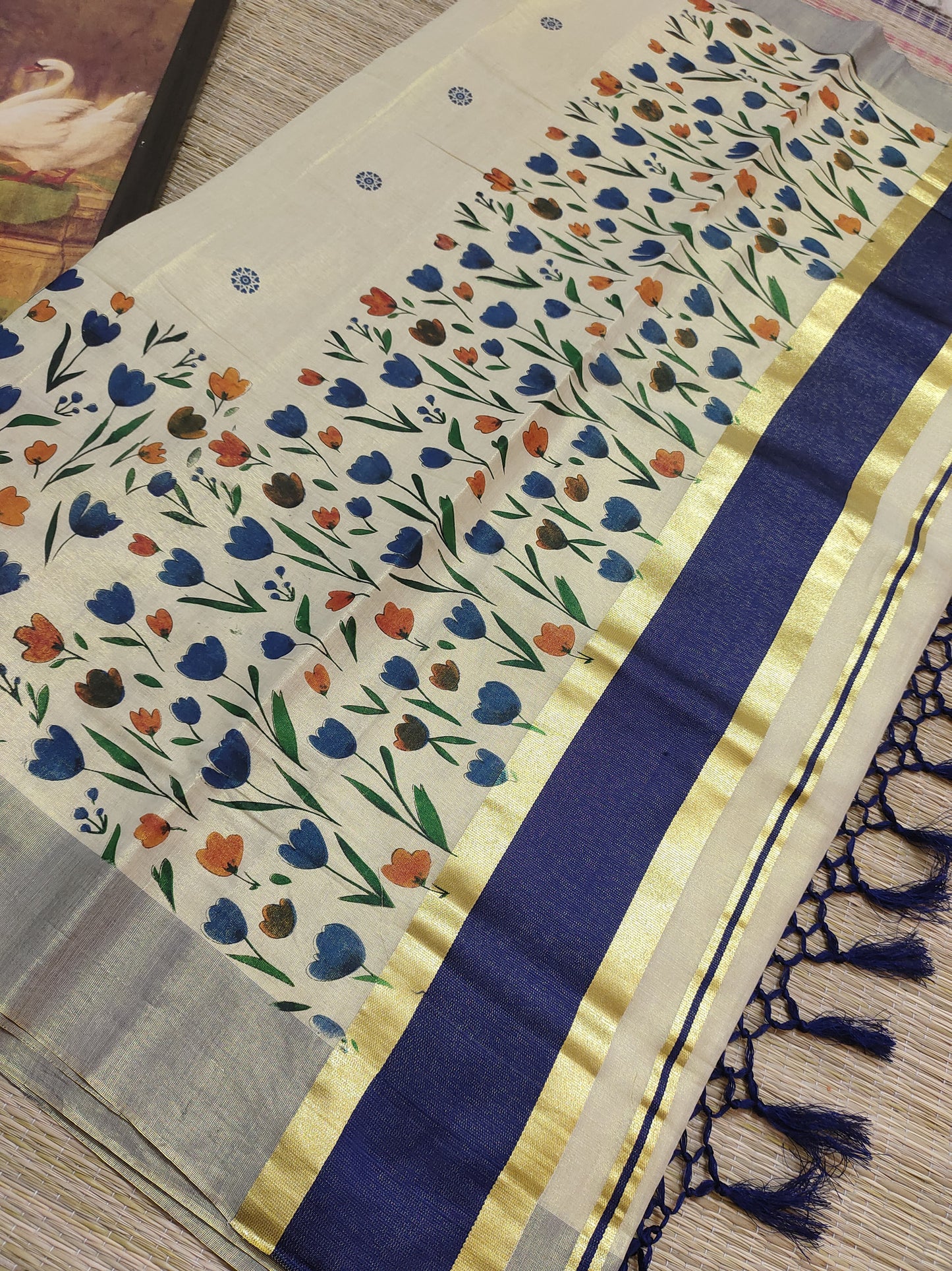 Premium  tissue saree featuring elegant floral prints
