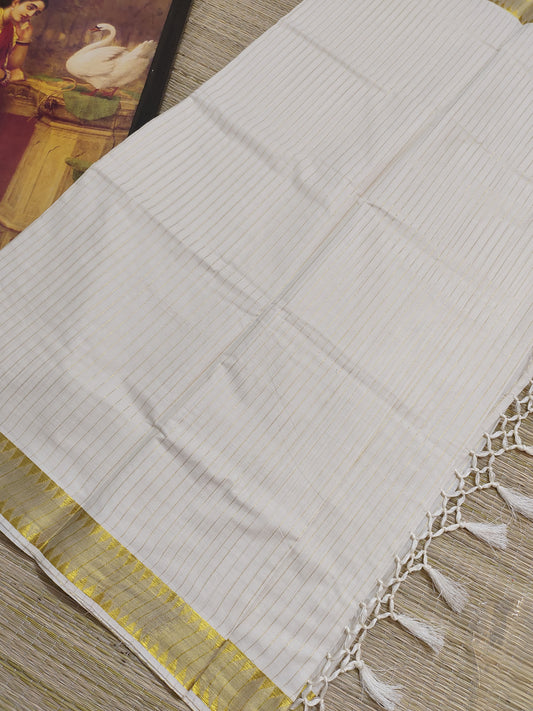 Premium cotton saree featuring all-over stripes and tassels