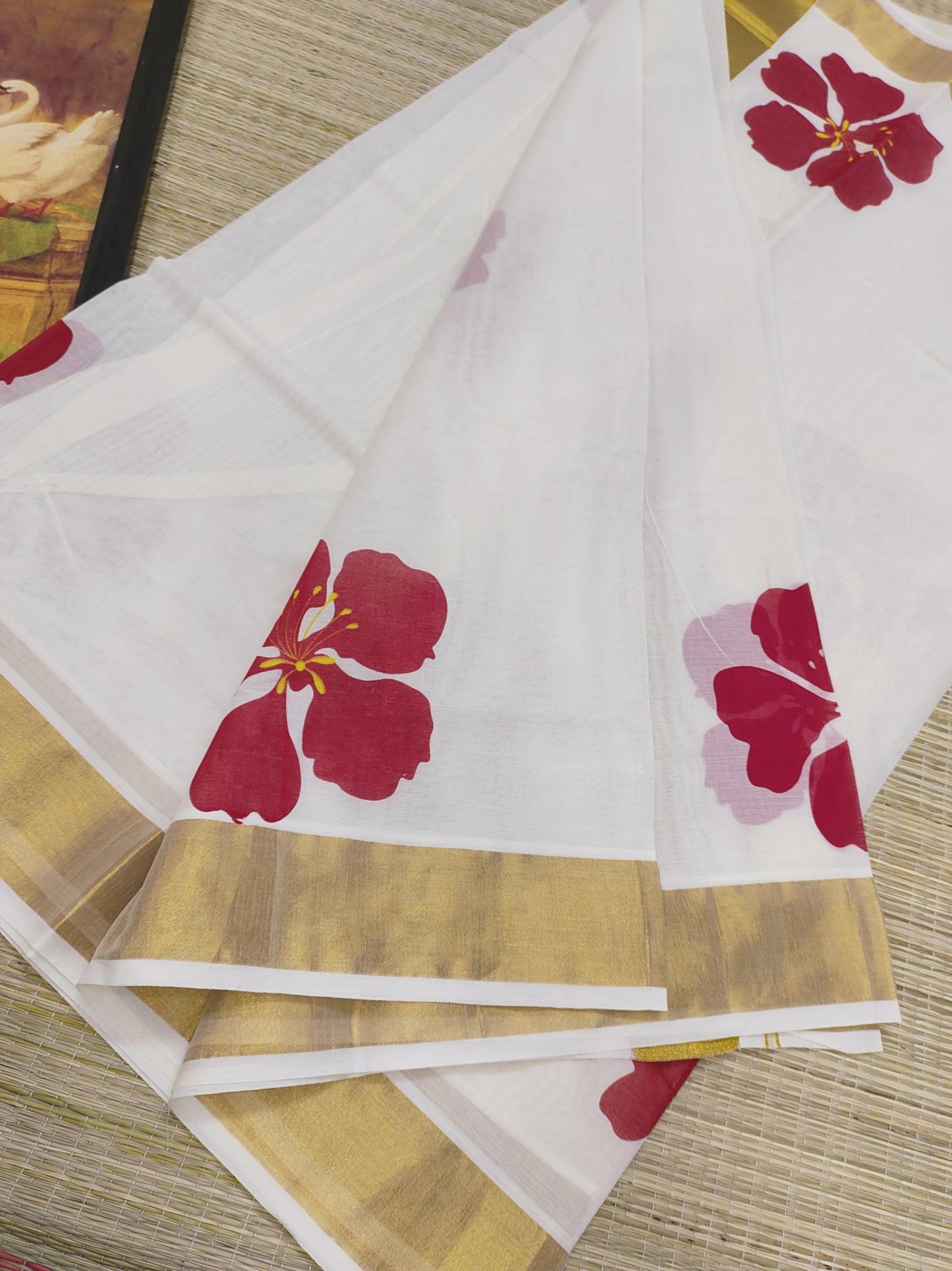 Premium Cotton Saree With Floral Print And Floral Printed Blouse.