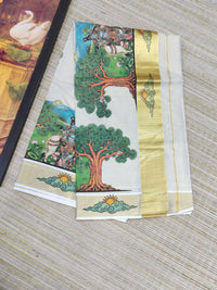 Golden tissue saree with mural prints and a plain running blouse
