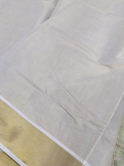Golden tissue saree with mural prints and a plain running blouse