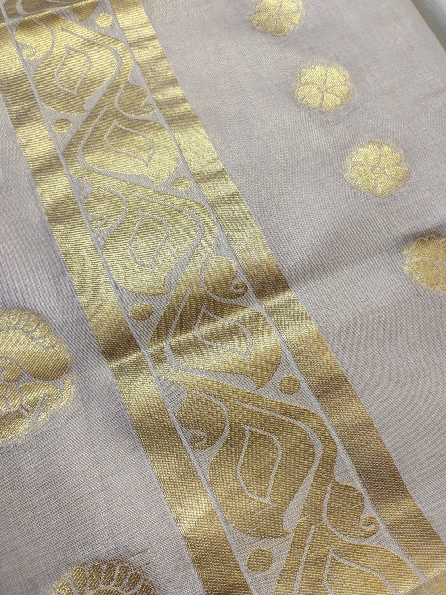 Premium Tissue Saree with body Woven Buttas