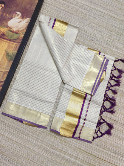 Half Plain Half Lines Tissue Set Mundu With Tassels And Velvet Sequence Blouse.