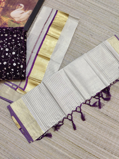 Half Plain Half Lines Tissue Set Mundu With Tassels And Velvet Sequence Blouse.