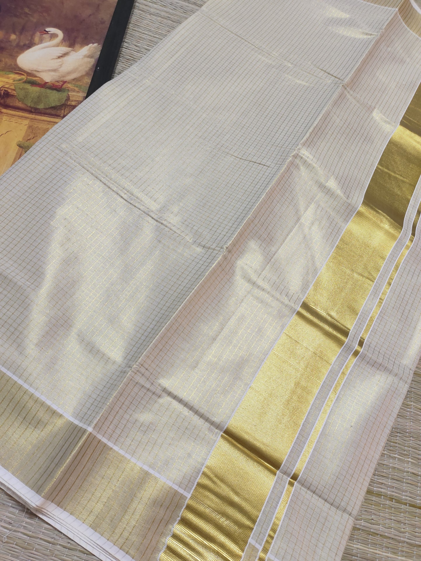 micro check kasavu saree