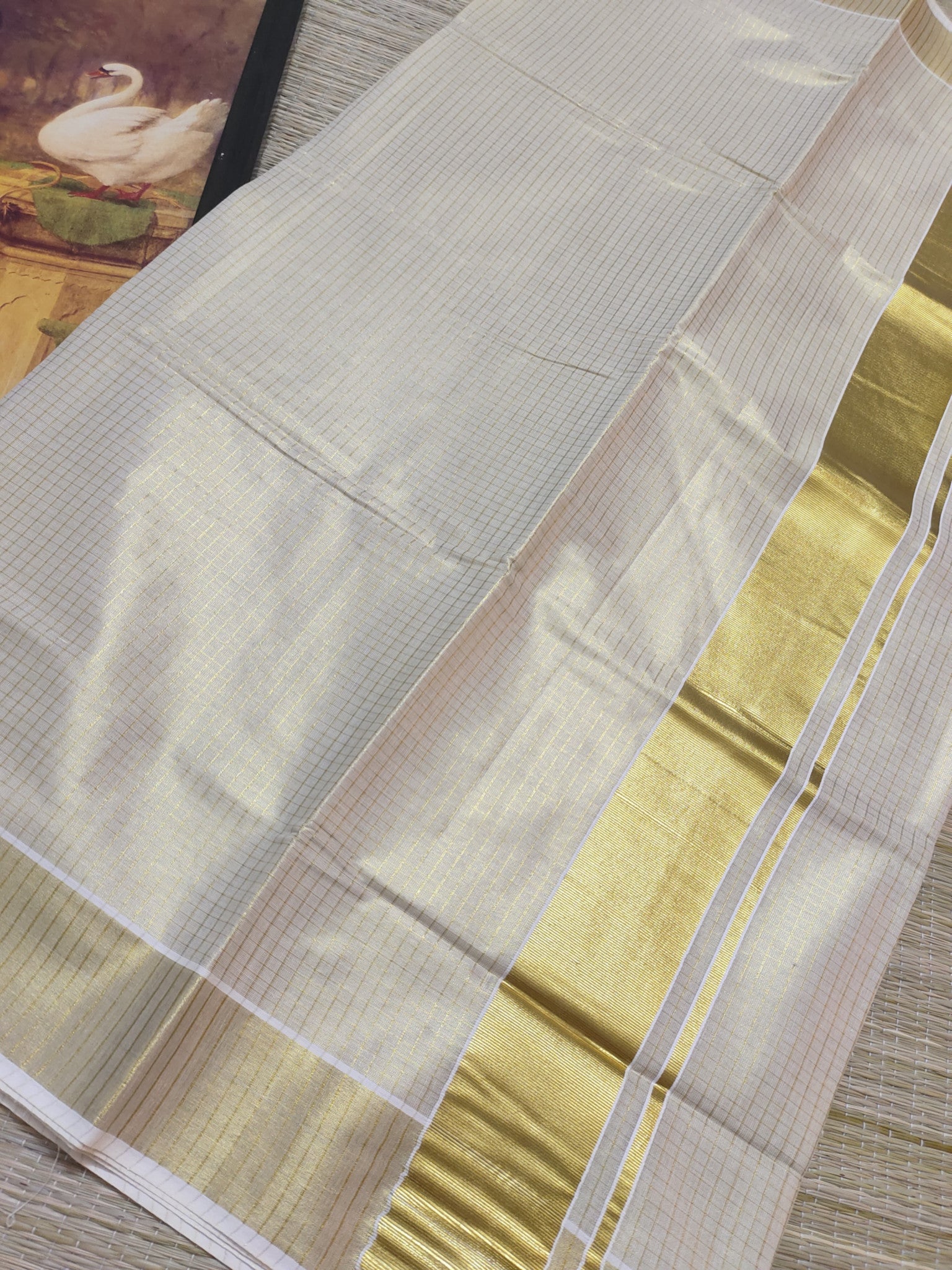 micro check kasavu saree