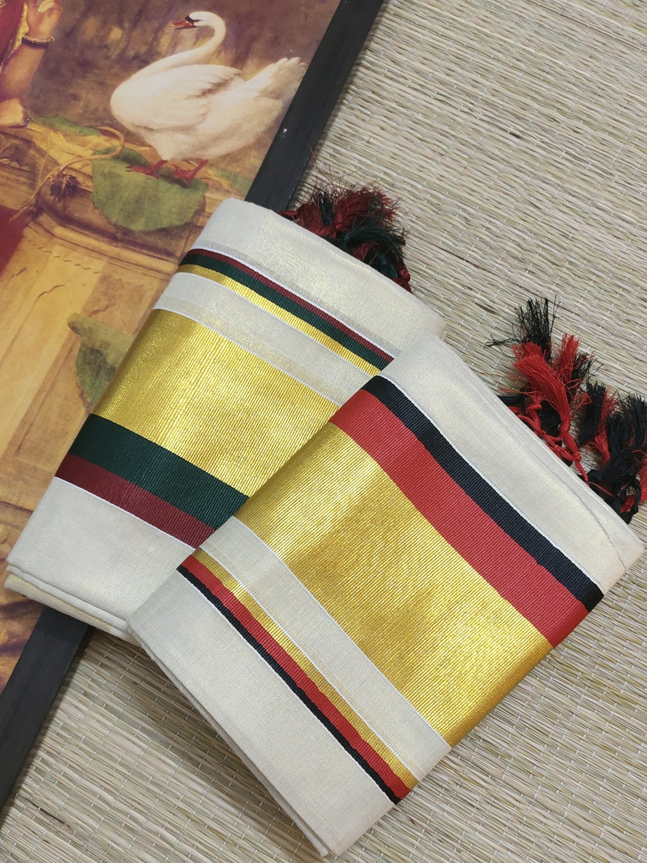 Tissue Set Mundu With Kasavu Kara And Tassels.